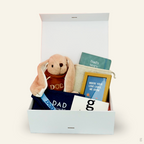 The Goodayy Playful dad gift bundle box set that includes a bunny soft toy with dad embroidery on the hoodie, playful dad designs on the frame, notebook, pouch.