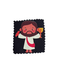 A square fabric patch with scalloped edges featuring a cartoon illustration of Jesus Christ holding a chalice with a cross, set against a plain white background.