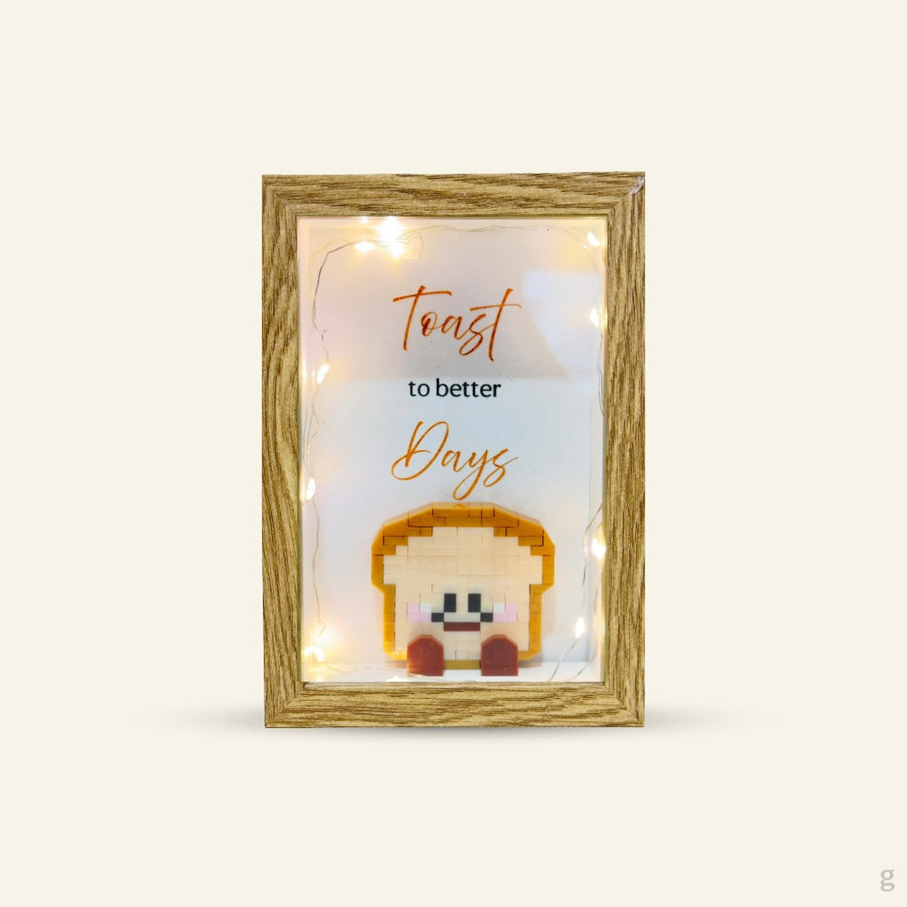 “Toast to Better Days” Frame