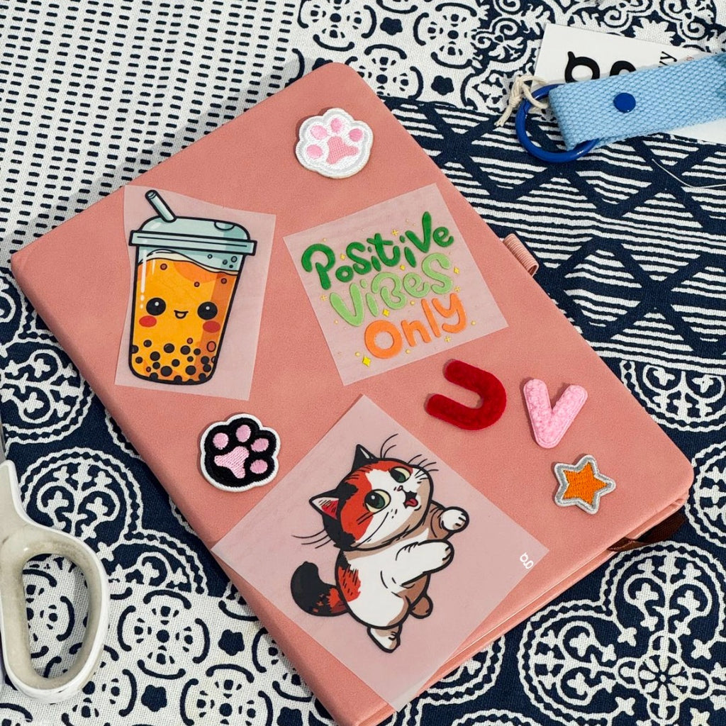 The Goodayy pink notebook with embroidery and print patches available here at The Goodayy.