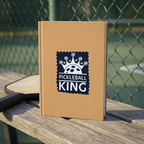 Pickleball King sticker on a hardcover notebook