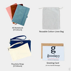The Goodayy personalized gift set bundle featuring a blue A5 notebook, cream wristlet pouch, and a cotton-linen drawstring bag tied with a red gingham ribbon and a greeting card.