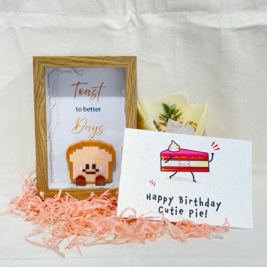 The Goodayy toast to better days gift set, including one greeting cards for your handwritten messages and a lego toast inside the natural wood frame.