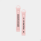 The Goodayy pink keychain strap tag with "crown with goodness, drips with abundance" and "Psalms 65 : 11" printed on the flip side